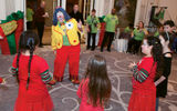 Each year, New York-based Protravel International holds a Children's Holiday Party for kids with brain tumors and their families. This year, the party was held in the ballroom at the Palace in New York, where more than 240 guests enjoyed activities, games, food and beverages, performers and even a visit from Santa, who gave each child gifts. Protravel's Arlene Feen traveled to New York from Miami to volunteer at the party, where she entertained the children dressed as a clown.