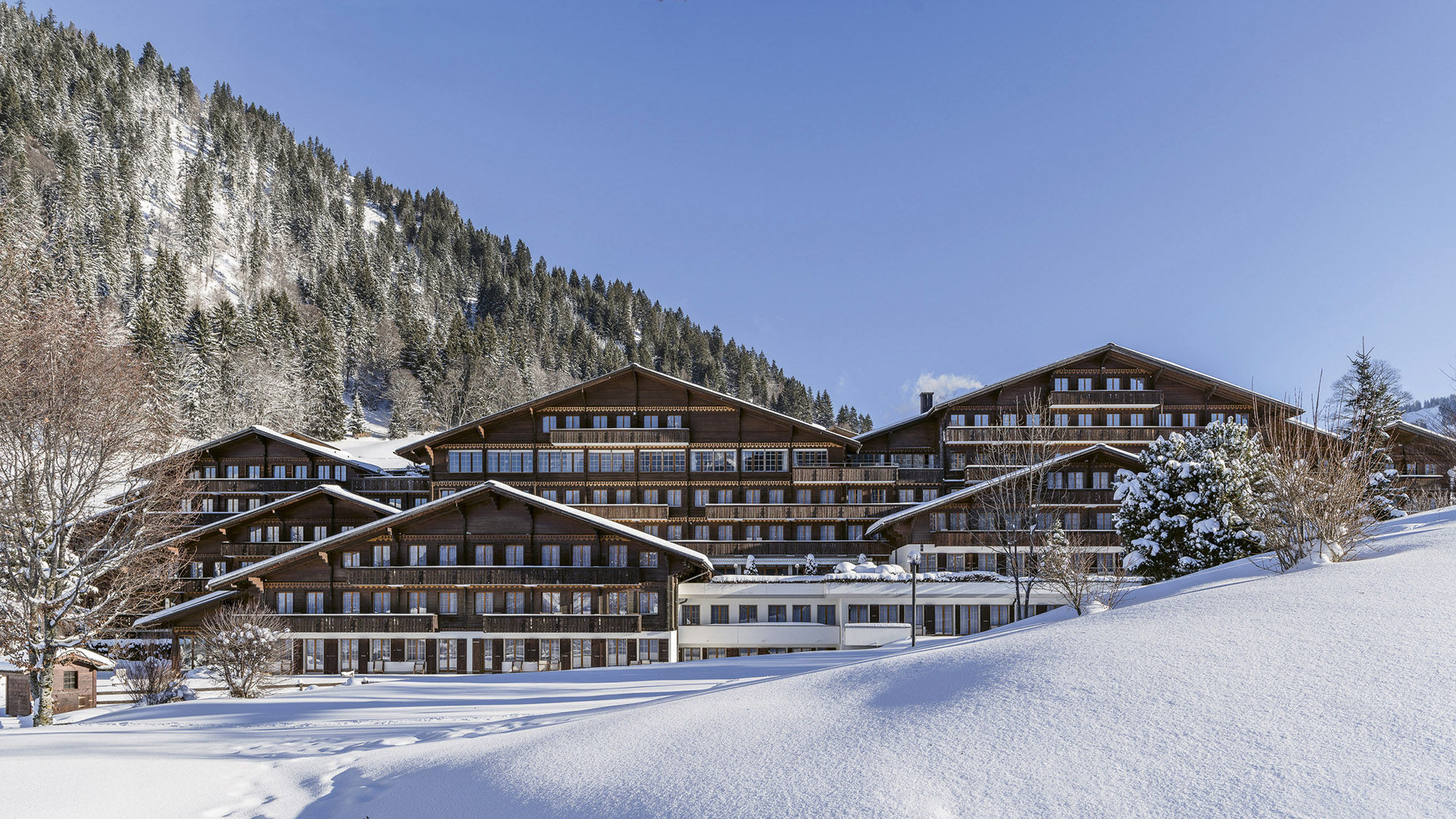 The Huus Gstaad hotel offers stunning mountain views and plenty of pampering after a day on the slopes.