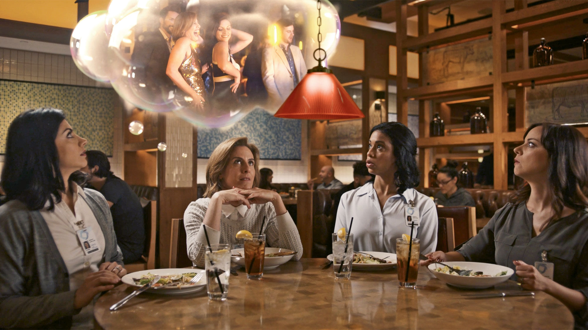 Scenes from the "What Happens Here, Stays Here" ad titled "Dream Vacation."