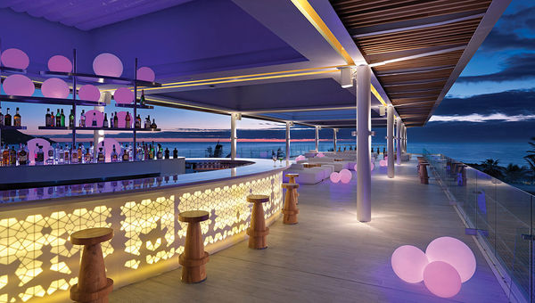Gabi Bar, atop the Gabi Beach open-air, beachfront restaurant, comes alive at night.