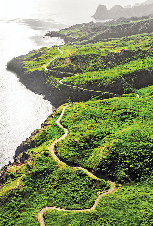 The winding road from Kahului to Hana features breathtaking oceanic vistas and roadside waterfalls with swimming holes. The winding road from Kahului to Hana features breathtaking oceanic vistas and roadside waterfalls with swimming holes.
