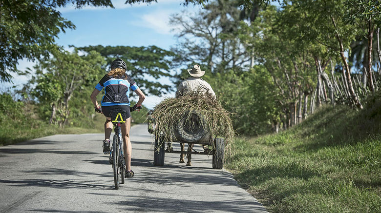 This year adventure travel specialist Backroads launched its Cuba Bike Tour, a people-to-people itinerary that enables guests to experience the country's ''national parks, rum and Latin rhythms.'' Pictured, a rider on the 26-mile Backroads Caimito Route in western Cuba.