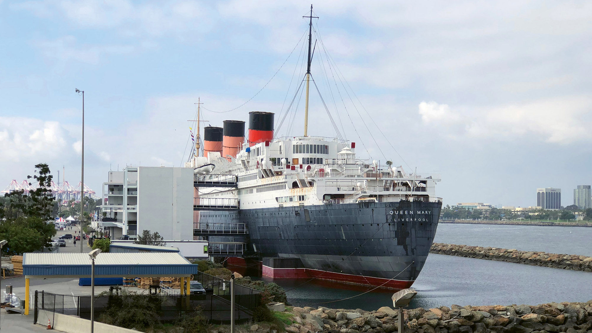 An aft view of the Queen Mary, a 1936 ocean liner that is now a floating hotel, in Long Beach, Calif.