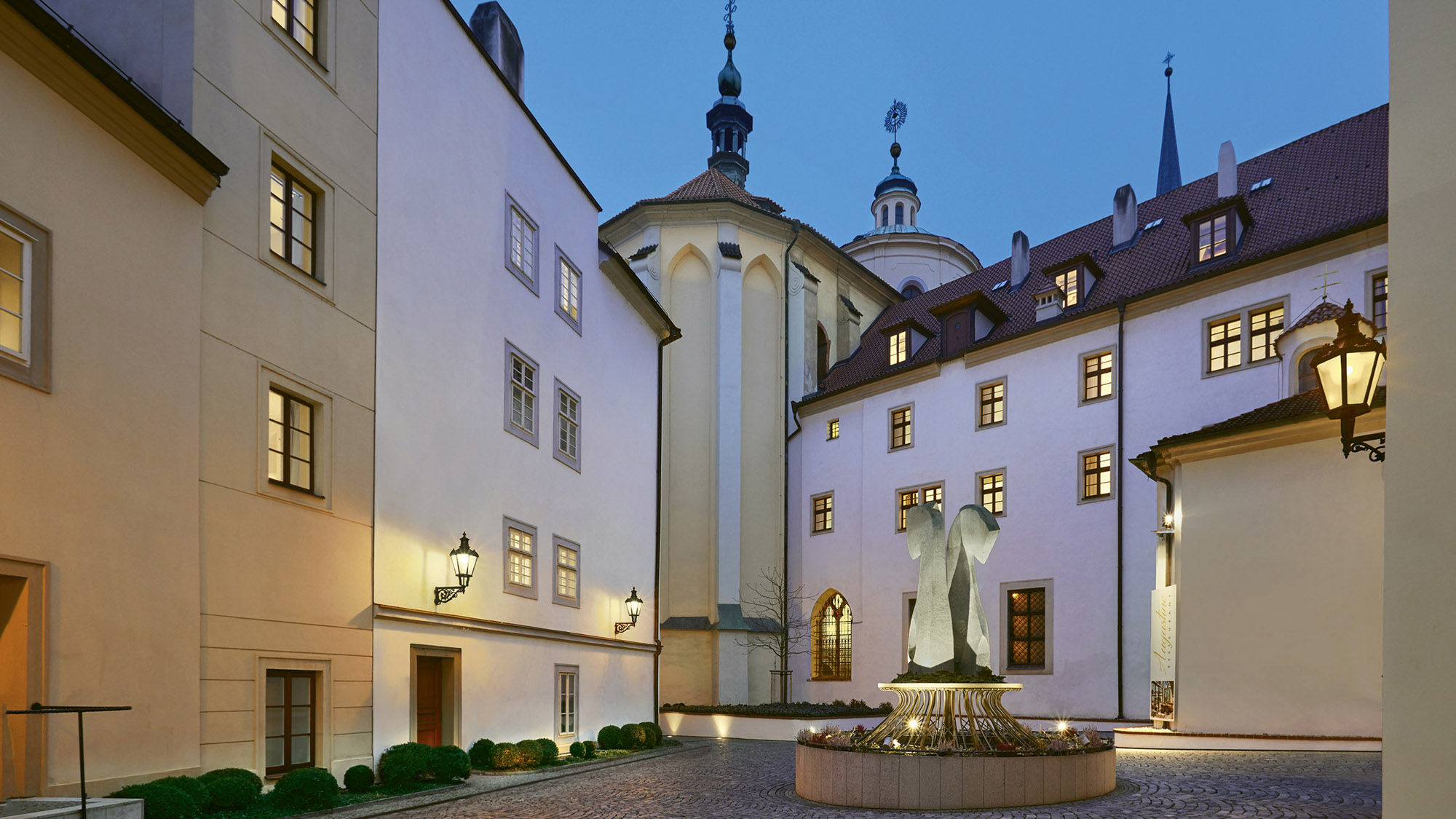 The courtyard at the Augustine. The hotel, which comprises seven buildings from a 13th-century church and monastery, retains many original architectural and design features.