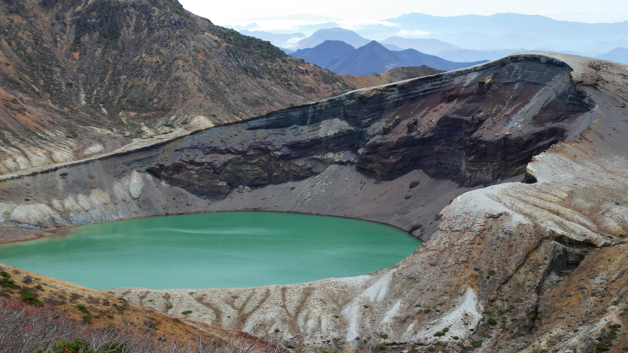 The Okama crater lake on Mount Zao, an active volcano.