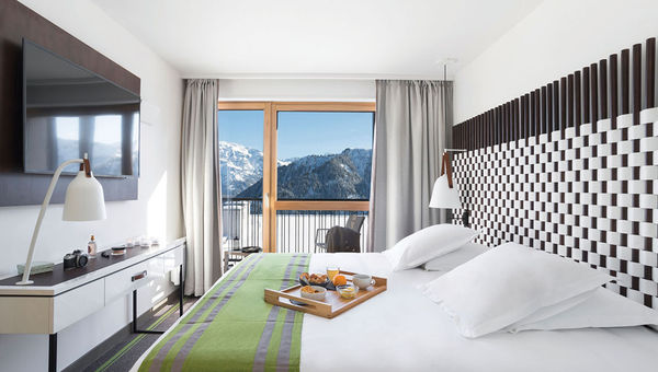 A guestroom at the Grand Massif Samoens Morillon, where four-person rooms come with a balcony or terrace. A guestroom at the Grand Massif Samoens Morillon, where four-person rooms come with a balcony or terrace.