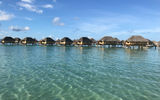 A row of overwater villas at Le Taha'a Island Resort & Spa, which is a 45-minute boat transfer from the Raiatea airport.