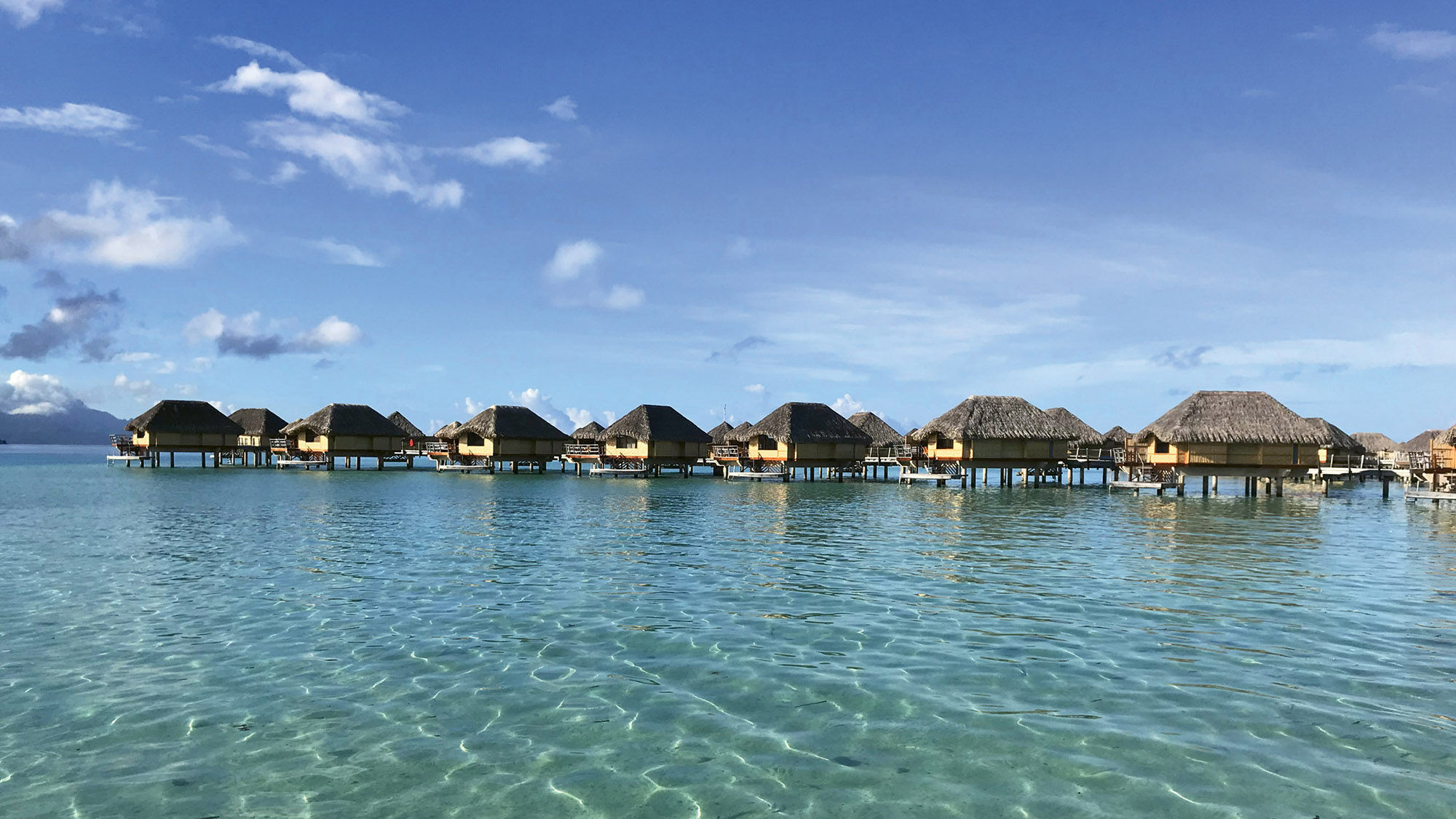 A row of overwater villas at Le Tahaa Island Resort & Spa, which is a 45-minute boat ride from the Raiatea airport.