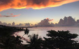 Sunset over the Tahitian Pearl Beach Resort, site of the inaugural Parau Parau Tahiti travel mart showcasing Tahiti's diverse tourism offerings.
