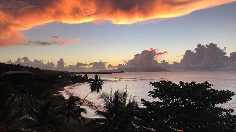 Sunset over the Tahitian Pearl Beach Resort, site of the inaugural Parau Parau Tahiti travel mart showcasing Tahiti's diverse tourism offerings.