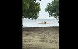A man in a traditional Polynesian outrigger canoe passes by the Taputapuatea marea, from where the Polynesians first set off to expand to other islands some 1,000 years ago. The sacred site is considered the homeland for the Polynesian people.