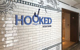 Royal Caribbean's first dedicated seafood restaurant called Hooked makes its debut on the Symphony.