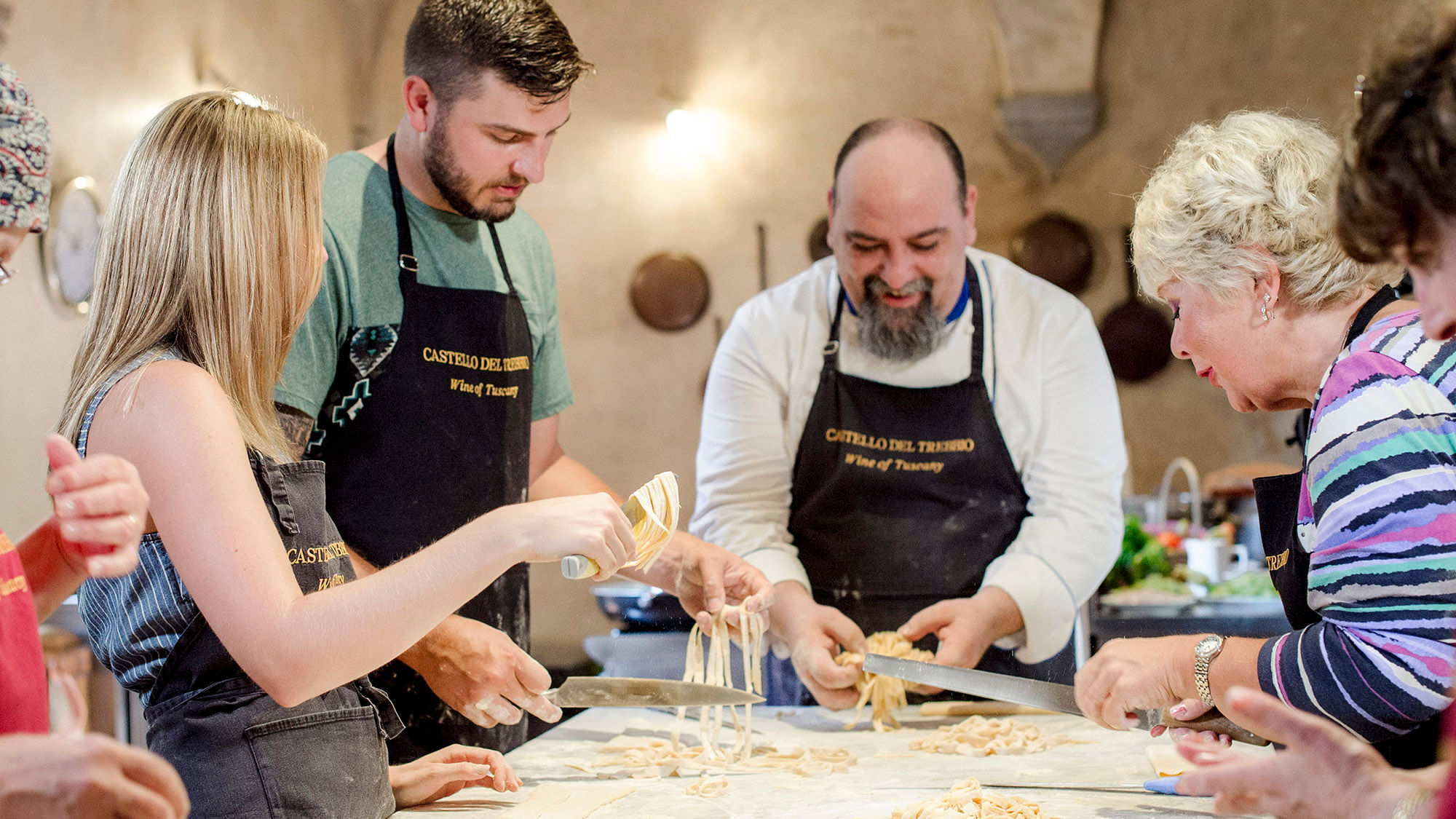Guests in Livorno, Italy, will enjoy fresh pasta paired with Italian wine after their cooking lesson at Castello del Trebbio, a medieval castle in the Tuscan countryside.