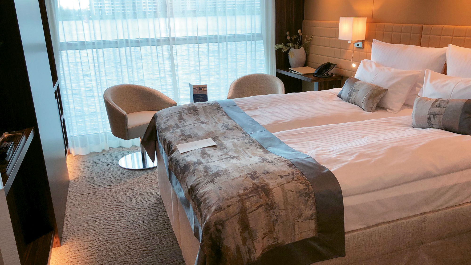Larger staterooms onboard the Amadeus Queen feature drop-down windows that function as a balconies.