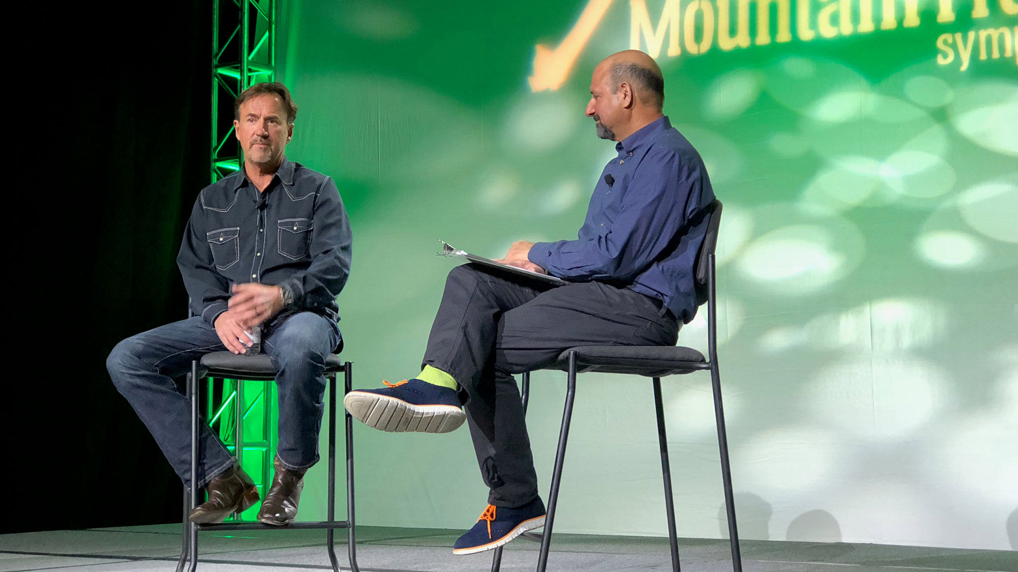 Andy Wirth, president and COO of Squaw Valley Ski Holdings (left) is interviewed by Bruce Rosard, forum producer for the Mountain Travel Symposium.