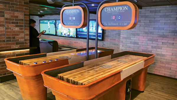 Shuffleboard at the Playmakers sports bar and arcade. Shuffleboard at the Playmakers sports bar and arcade.