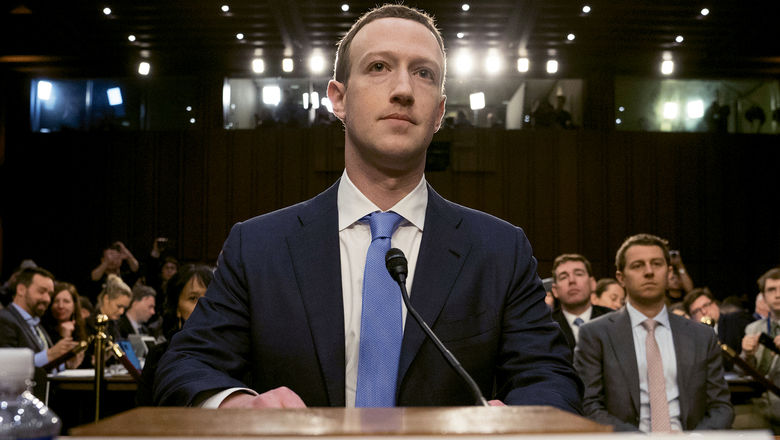 Facebook CEO Mark Zuckerberg testifies before a joint hearing of the Commerce and Judiciary committees on Capitol Hill in Washington on April 10 about the use of Facebook users' data to target U.S. voters in the 2016 election.