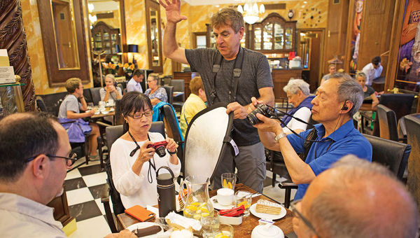 Photojournalist and travel writer Mark Edward Harris, center, teaches photo workshops on Uniworld cruises. Photojournalist and travel writer Mark Edward Harris, center, teaches photo workshops on Uniworld cruises.