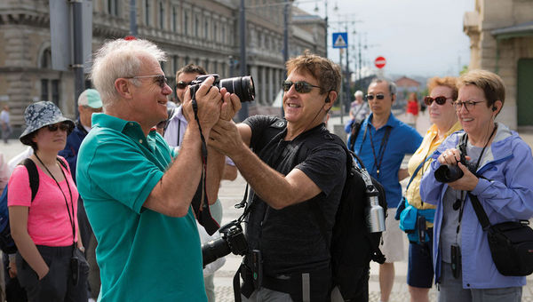 Mark Edward Harris assists a photography workshop participant during an excursion. Mark Edward Harris assists a photography workshop participant during an excursion.