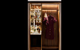 Each guest room will have a bar. Hanging on the hook is a vintage uniform designed by Valentino and worn by TWA flight attendants from 1971 to 1975. It will be on display in the TWA Hotel Museum.