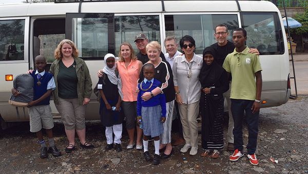 From left, the Travel Experts team and guests with the children they sponsor: 10-year-old Justice and sponsor Heather McIntyre, 12-year-old Feiruz with sponsors Claire and Allan Canaday, 7-year-old Joyce with sponsors Sharon and Michael Fake, and Susan and Steve Ferrell with Mwanaidi and Justus. From left, the Travel Experts team and guests with the children they sponsor: 10-year-old Justice and sponsor Heather McIntyre, 12-year-old Feiruz with sponsors Claire and Allan Canaday, 7-year-old Joyce with sponsors Sharon and Michael Fake, and Susan and Steve Ferrell with Mwanaidi and Justus.
