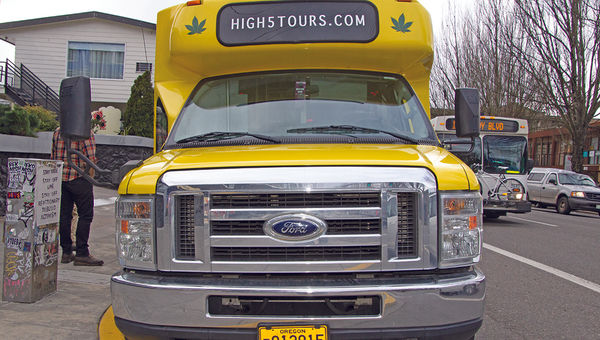 High 5 Tours’ bright yellow Cannabus waits for guests of its CannaPDX tour outside the Doug Fir Lounge. High 5 Tours’ bright yellow Cannabus waits for guests of its CannaPDX tour outside the Doug Fir Lounge.