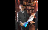 Rwandan president Paul Kagame reads the April 23, 2018 Travel Weekly cover story ''Rwanda Rising,'' about the making of Peter Greenberg's ''Rwanda -- The Royal Tour.'' He was in New York on April 24 for a screening of the film prior to its premiere on PBS.
