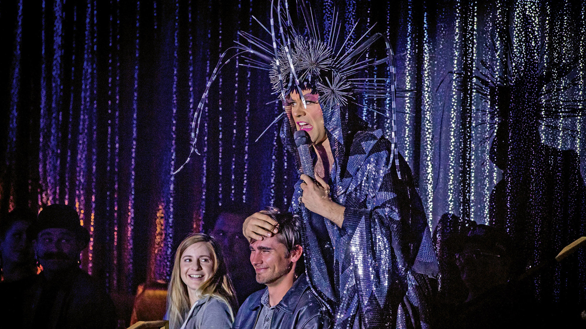 Dusty Moonboots acts as a glamorous, singing master of ceremonies during “Opium” at the Cosmopolitan’s theater.