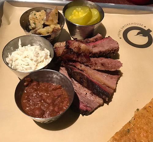 Brisket and sides at the Q Texas Smokehouse.