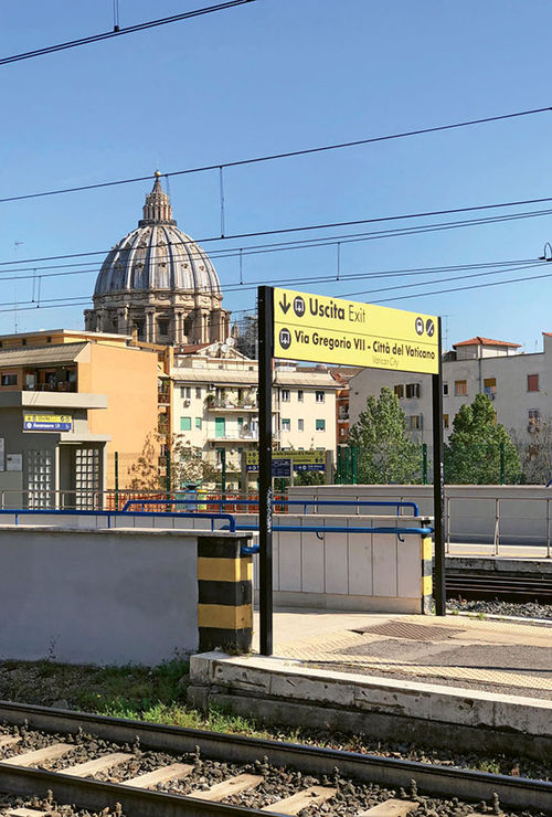 The San Pietro station with the dome of St. Peter’s Basilica in the background.