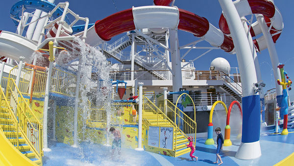 A 150-gallon tipping bucket inspired by the Cat’s hat soaks anyone lucky enough to be standing underneath it at the waterpark on Deck 12. A 150-gallon tipping bucket inspired by the Cat’s hat soaks anyone lucky enough to be standing underneath it at the waterpark on Deck 12.