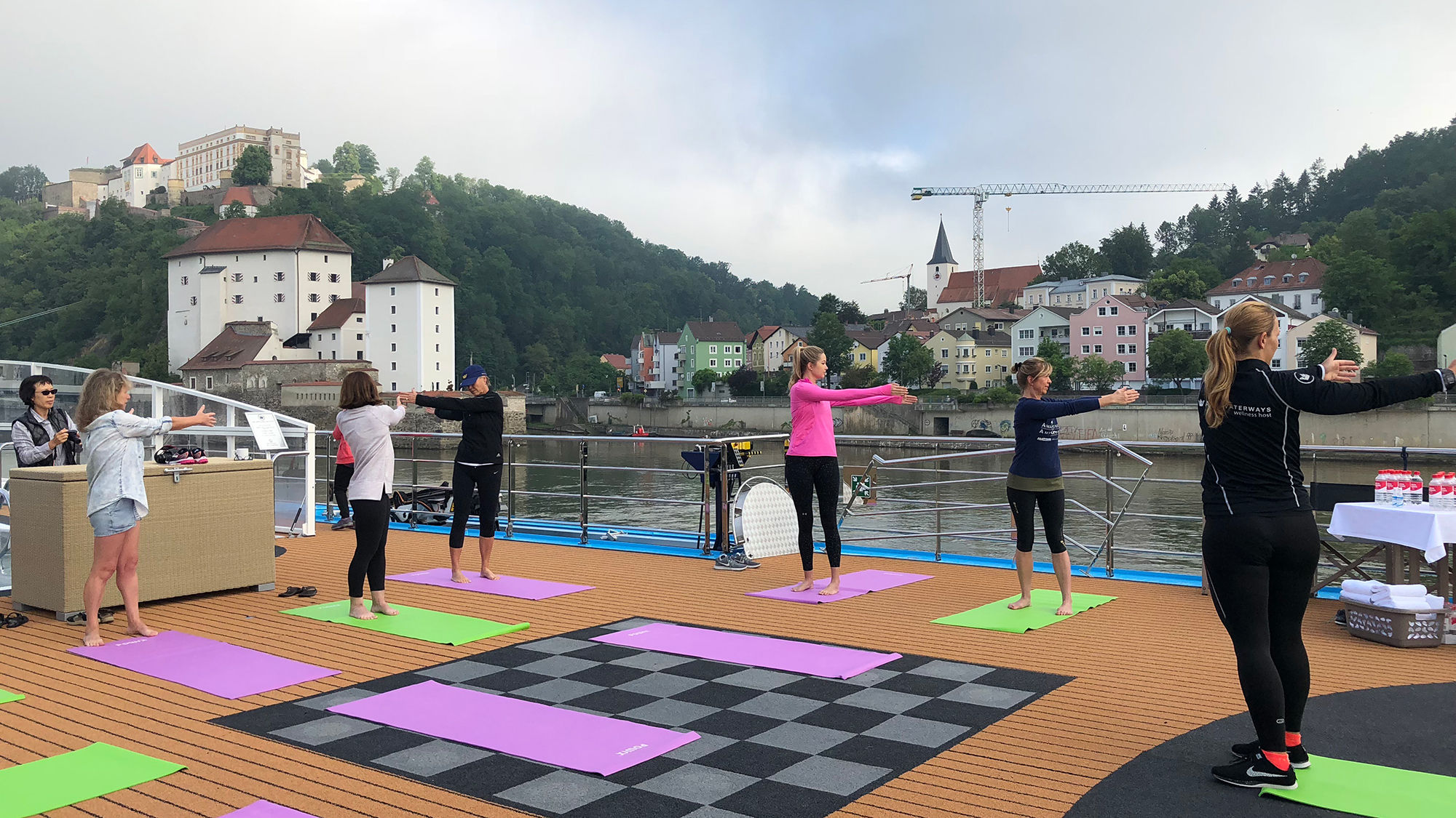 Wellness instructor Selina Wank leads a stretching and core-strengthening class on the sun deck of the AmaLea.