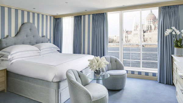 A suite on Uniworld’s newly renovated Beatrice with a floor-to-ceiling view of the Hungarian Parliament.