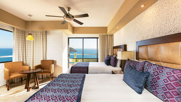 Luxury Double or Luxury King rooms have private balconies, marble bathrooms and partial ocean views. Luxury Double or Luxury King rooms have private balconies, marble bathrooms and partial ocean views.