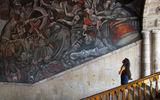 The stairwell of the Palacio de Gobierno features a fresco mural by Jose Clemente Orozco depicting key World War II figures as well as Miguel Hidalgo, a leader in the Mexican War of Independence.