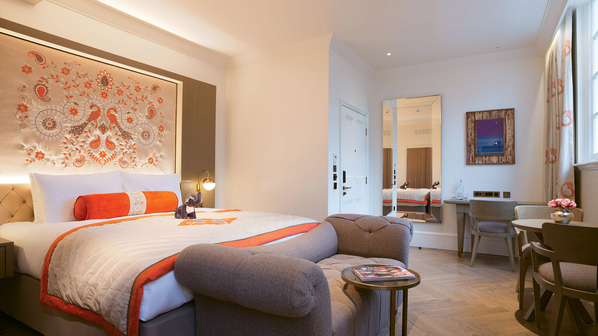 The names of some guestrooms at the Lalit London, such as the Senior Classroom shown here, pay homage to the property’s past as a school.