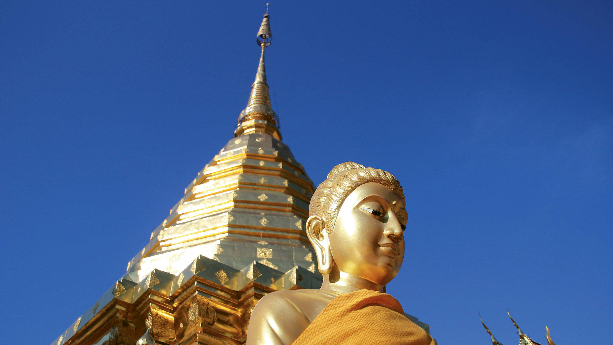 One of the scores of Buddha statues at the Wat Phra That Doi Suthep temple complex in Chiang Mai, Thailand.