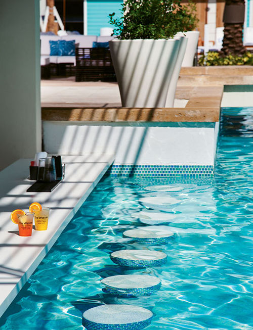 The swim-up bar is part of a redesigned pool area at the Westin Grand Cayman. The swim-up bar is part of a redesigned pool area at the Westin Grand Cayman.