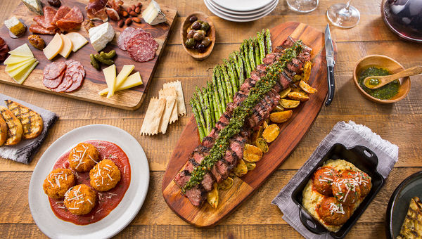 Grilled skirt steak, spiced olives and a charcuterie board from Wine Bar George at Disney Springs. Grilled skirt steak, spiced olives and a charcuterie board from Wine Bar George at Disney Springs.