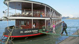 Passengers boarding the Angkor Pandaw in Ha Long Bay, a Unesco World Heritage Site.
