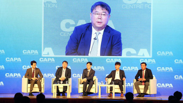Eastar Jet’s Jong Gu Choi (second from left) believes North Korea will open its skies first before its land borders in the event of any reunification. Eastar Jet’s Jong Gu Choi (second from left) believes North Korea will open its skies first before its land borders in the event of any reunification.