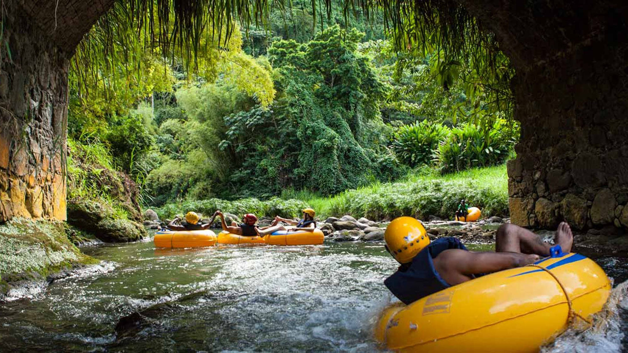 Cruise passengers can do river tubing in Dominica.