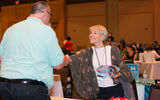 Josh Oretsky of Galaxy Travel & Cruises and Jessica Bondero of Avis Budget Group meet during their one-on-one appointment.