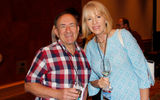 Joel Cohen of NYC Vacation Packages and Beth Widhson Arena of Seabourn enjoy a cocktail during the Supplier Meet & Greet at GTM's opening night.