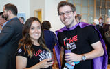 Representing the Closing Reception sponsor, G Adventures, Devyn Maniff and Jeremy Brady pose before addressing the GTM attendees.