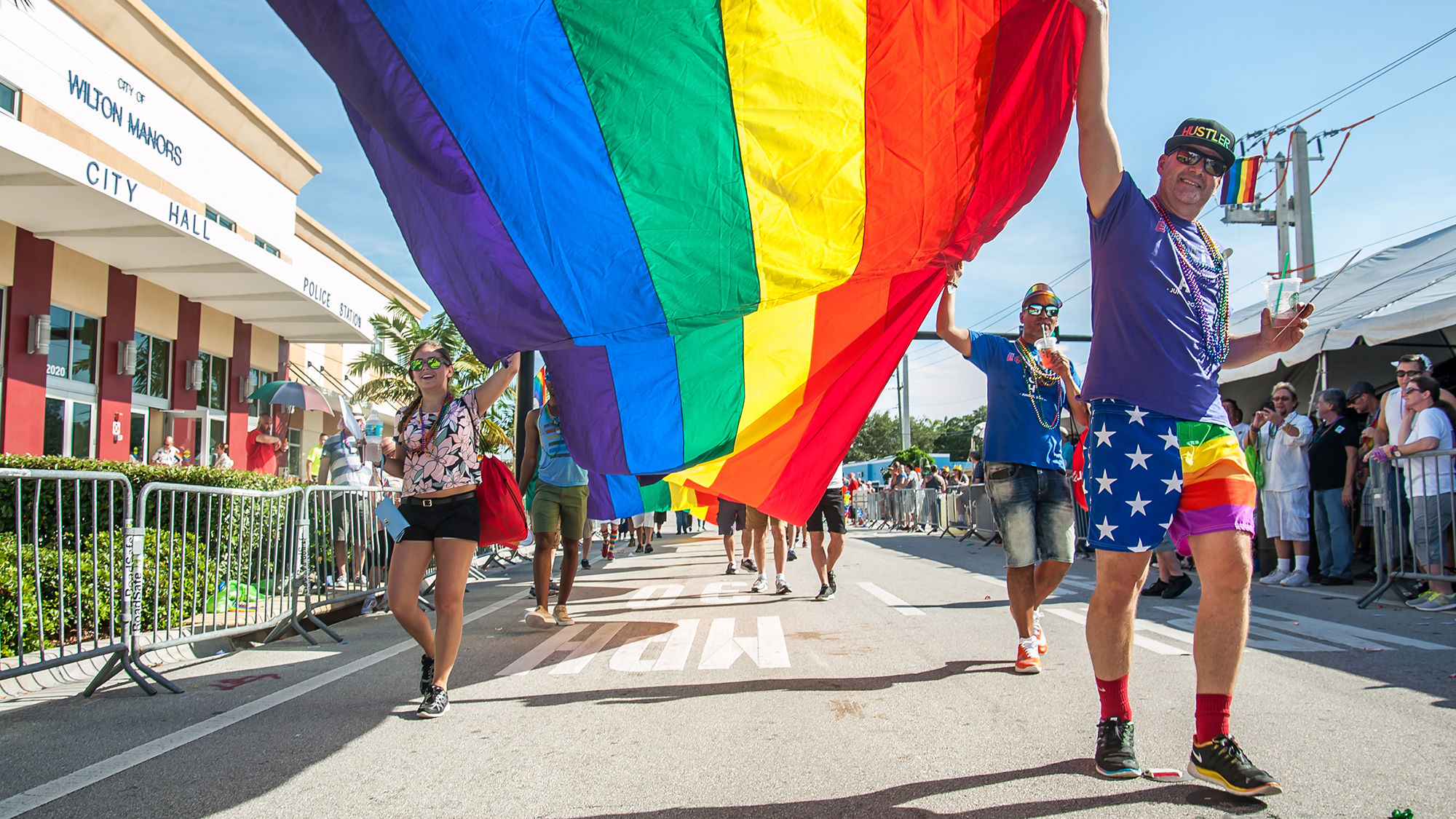 A rainbow banner makes it way through Wilton Manors during the 2017 Pride parade.