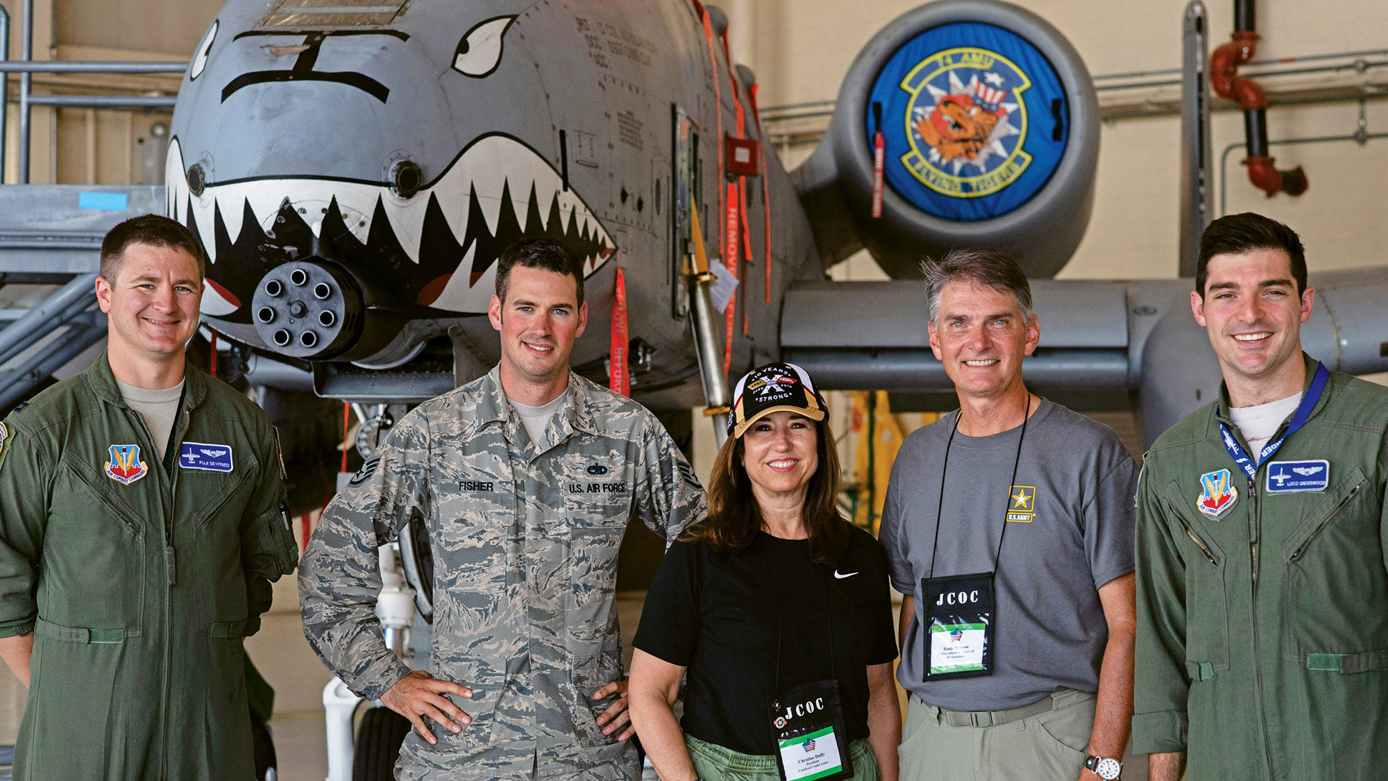 Carnival Cruise Line president Christine Duffy, center, with members of the 23rd Air Wing and fellow Joint Civilian Orientation Course participant Randy Anderson, second from right, former CEO of Canyon Vista Medical Center, at Moody Air Force Base near Valdosta, Ga.