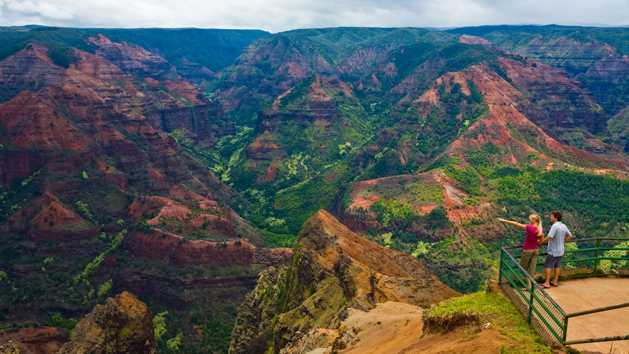 Waimea Canyon, roughly 10 miles long and reaching 3,000 feet deep, is often called the "Grand Canyon of the Pacific."