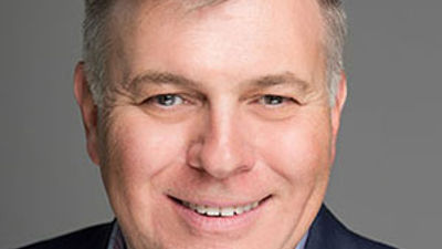 Hilton names Danny Hughes EVP, president of the Americas