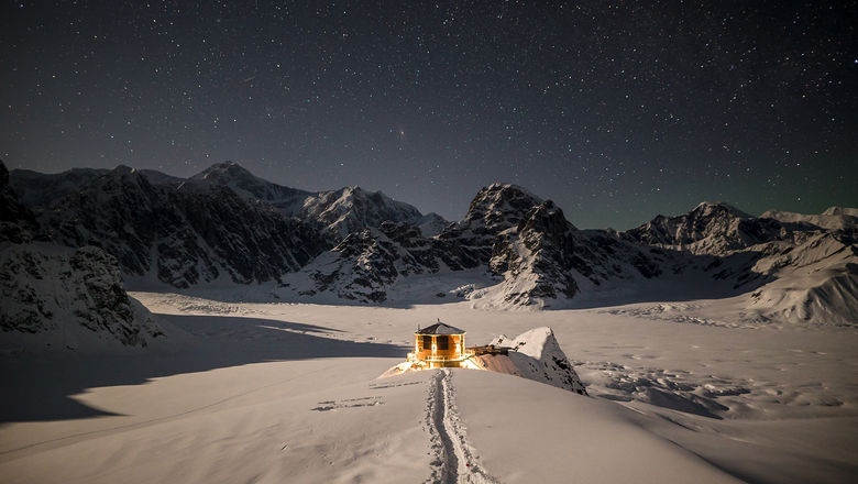 Sheldon Chalet is tucked on a rocky outpost above the Don Sheldon Amphitheater on Denali's Ruth Glacier.